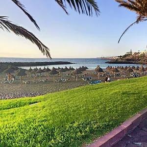 Beach And Pool In Playa de las Americas (Tenerife)